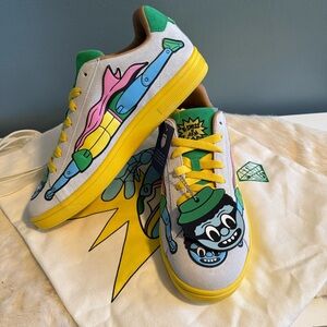 K-Swiss Court Tiebreak II x Rakeem Miles Action Figure Sneakers with Tote Bag